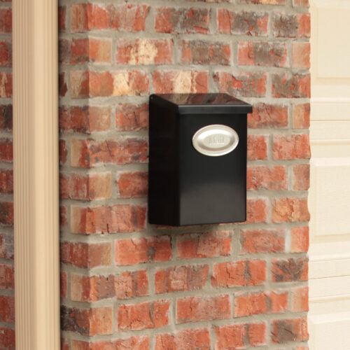 Designer wall mount mailbox on a brick wall