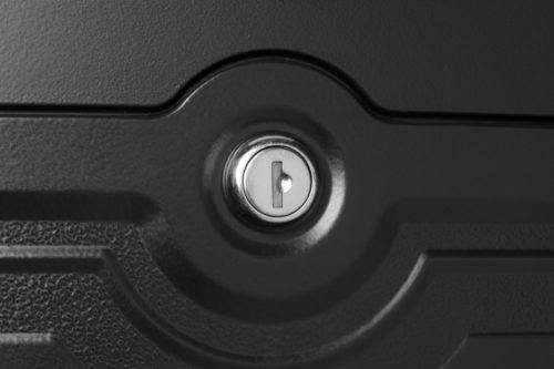 Zoomed image of lock on black wall mount mailbox