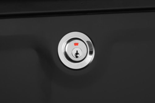 Zoomed image of lock on black wall mount mailbox