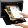 Open black wall mount mailbox with mail inside