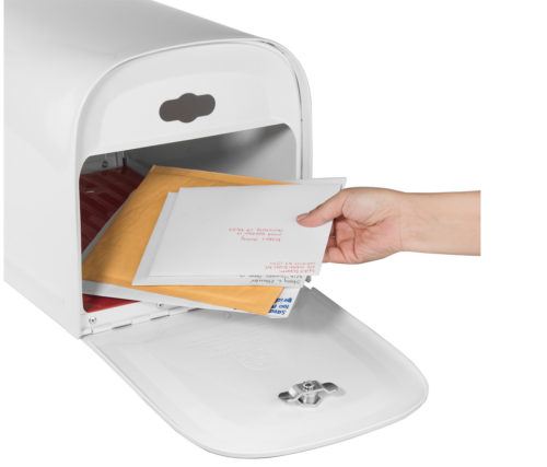 Open white mailbox with mail inside