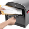 Open black mailbox with mail inside