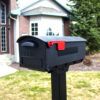 Decorative Background of Black Post Mount Mailbox with Red Flag